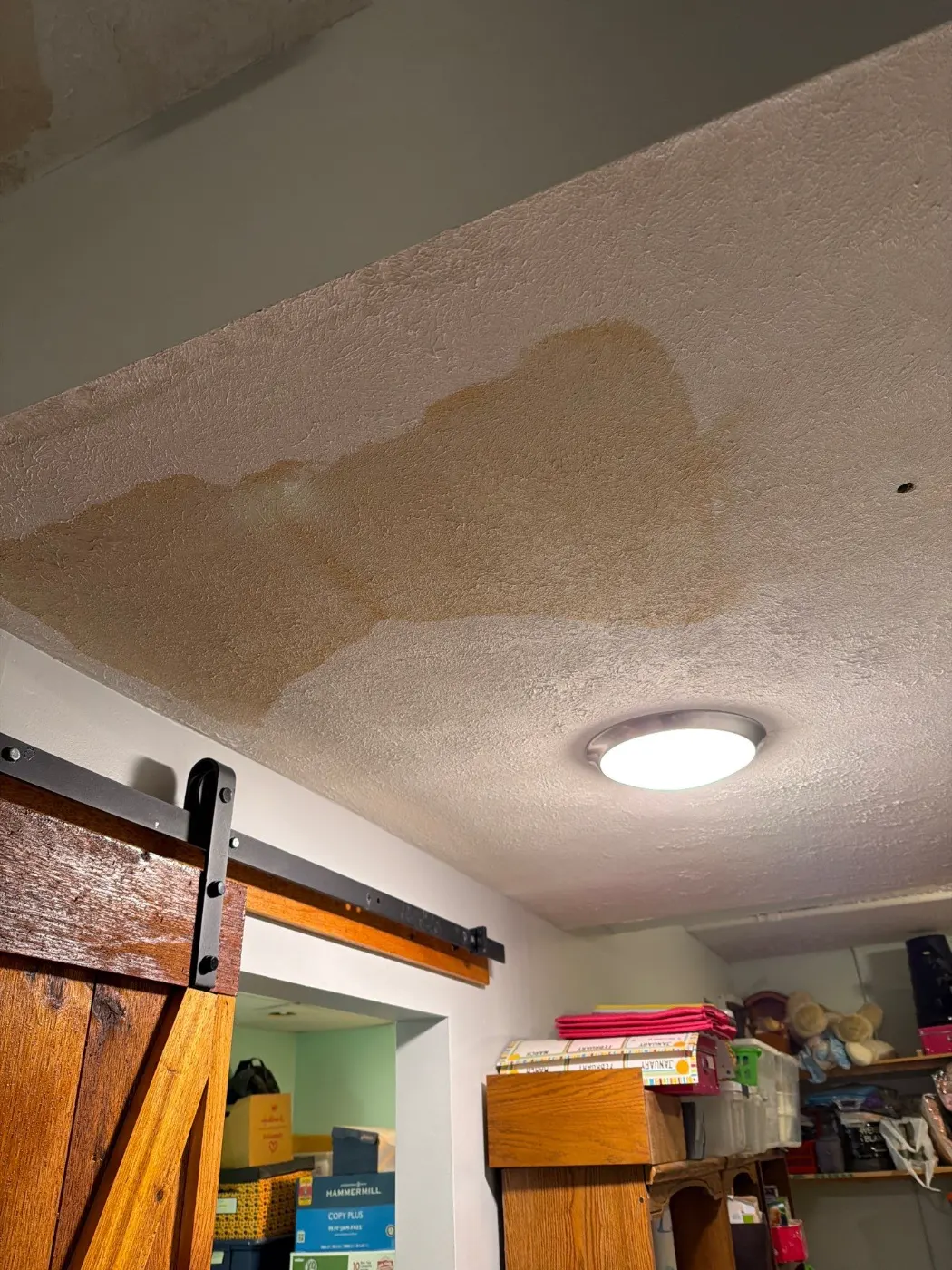 Certified restoration crew at work on Stones Crossing residence